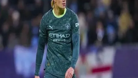 中国男篮以关岛队为对手取得胜利，荣登小组第一晋级正赛